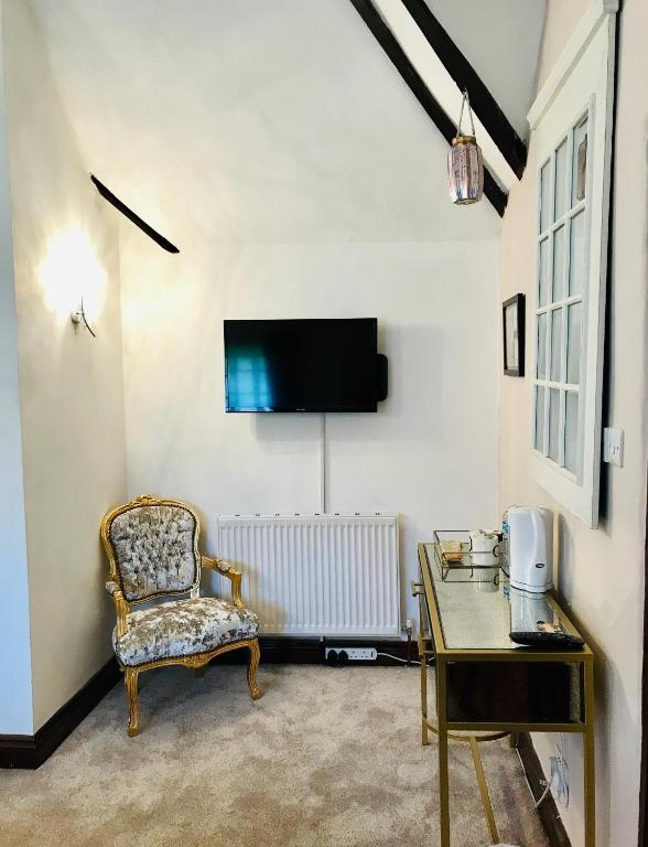 Room corner with gold chair